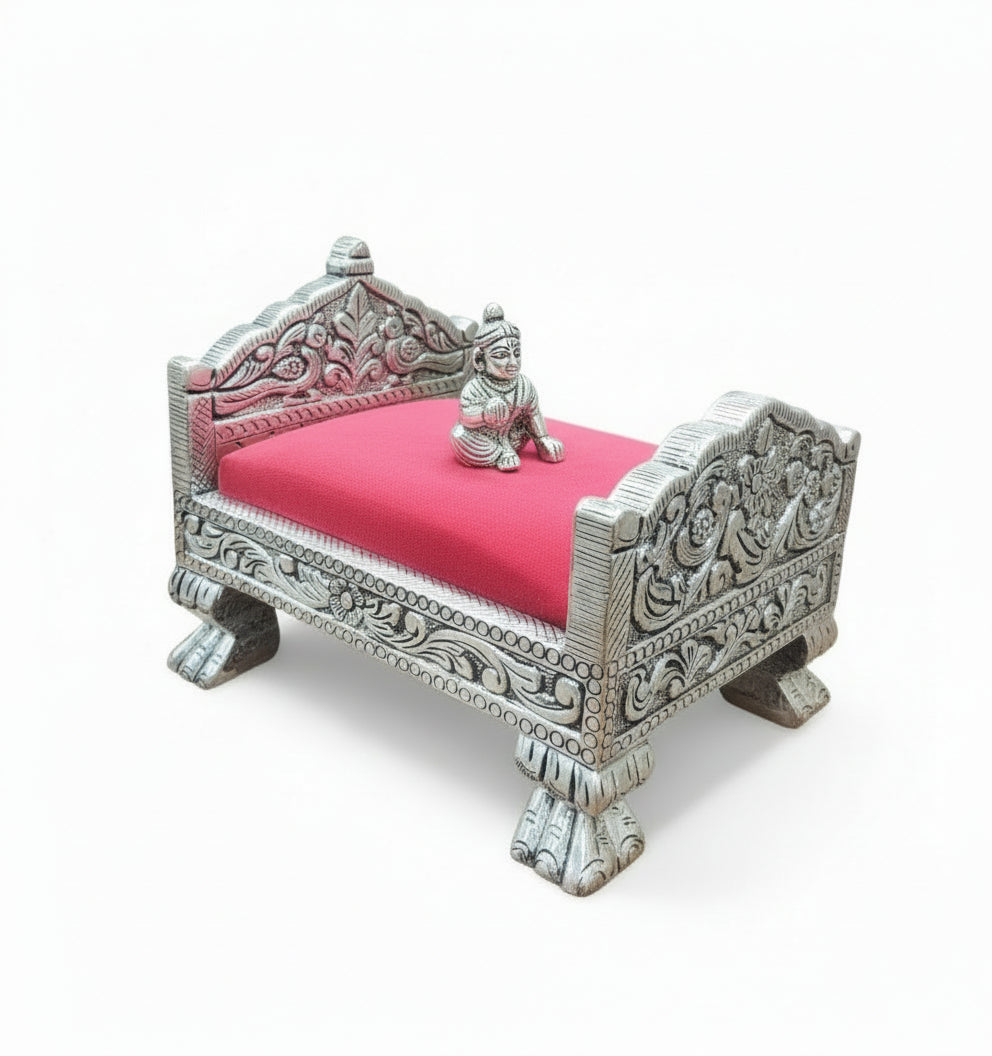 Silver bed for shree Krishna (worship)